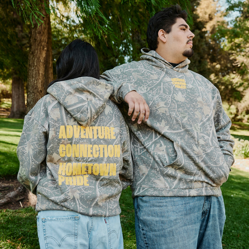 Adventure. Connection. Hometown Pride. Printed Camo Hoodie