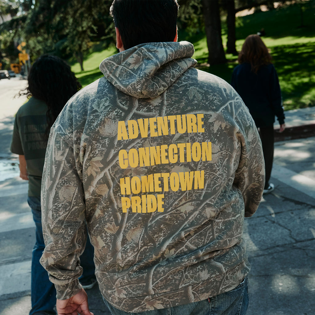 Adventure. Connection. Hometown Pride. Printed Camo Hoodie